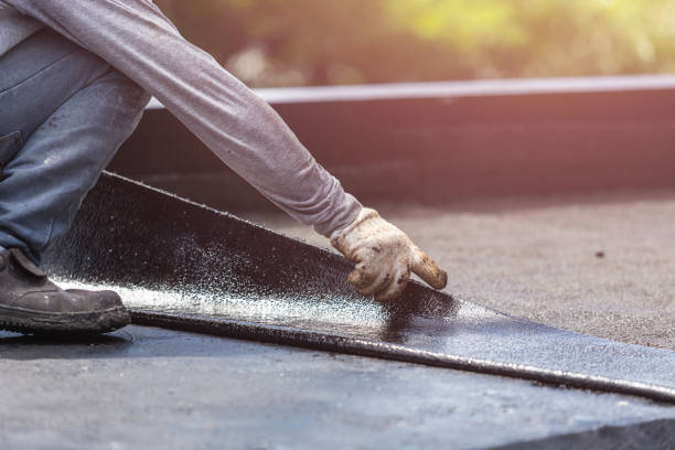 Professional Basement Waterproofing technician working in Brinklow, MD